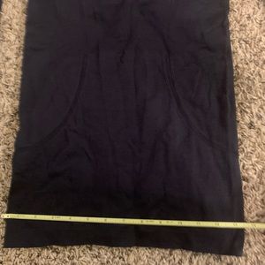 Lululemon swiftly top with thumb holes, size 4. Color black.